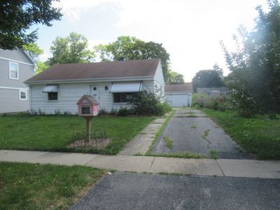 209 N William St