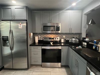 5830 NW 64th Ave APT 103