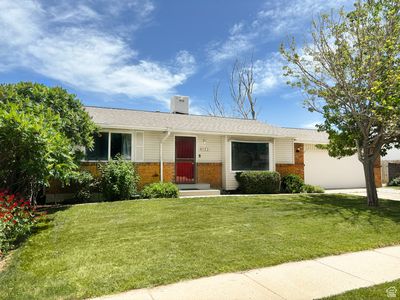 6153 S Woodsborough Way W