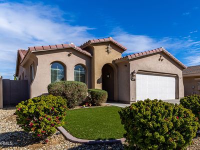 10768 W Woodland Ave