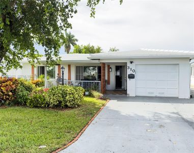 310 NW 25th Ct
