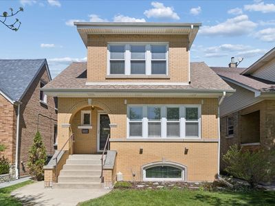 6037 N Menard Ave