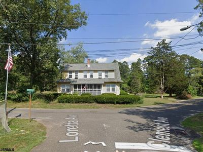 1409-1411 Loretta Ave