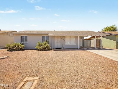 7733 W ORANGE Drive