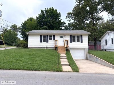 114 W 10th St
