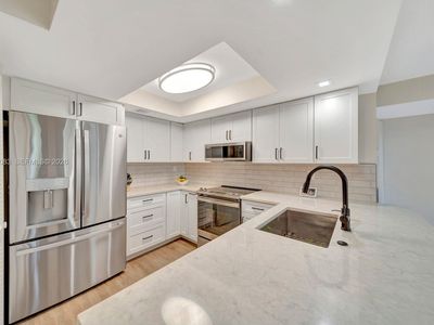 12455 SW 93rd Ter APT 403T