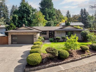 10405 SW Paulina Dr