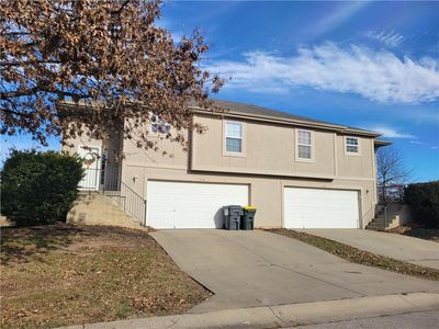 Property at 218 N 6th Ter, Louisburg, KS