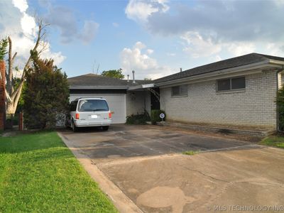 6916 E 15th Pl
