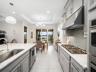 9597 SW Royal Poinciana Drive