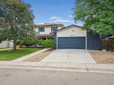 6449 S Locust Way