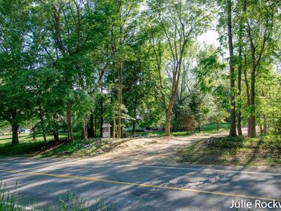 Property at 1085 Honey Creek Ave NE, Ada, MI