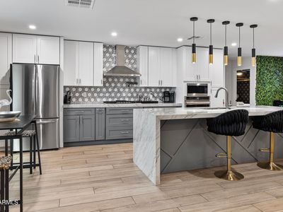 8707 E Clarendon Ave