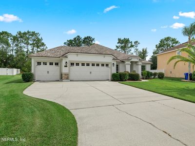 2421 E CAPARINA Drive