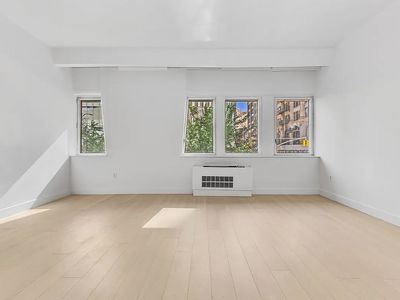 25 W Houston St APT 2B