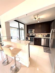 671 NE 195th St APT 227-E