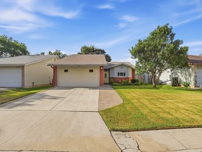 6906 SUNSET VILLAGE DR