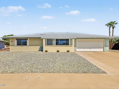 12221 N COGGINS Drive
