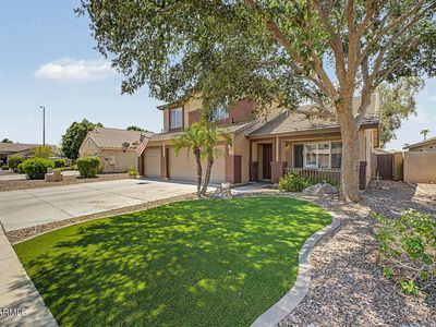 8227 W HARMONY Lane