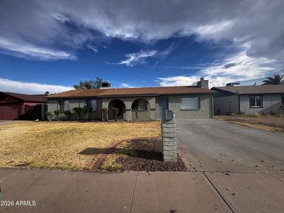 1941 W VOLTAIRE Avenue
