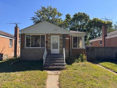 14505 S Woodlawn Ave