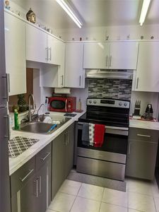 233 NE 14th Ave APT 205