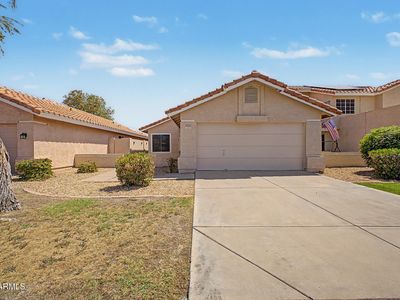 8021 W PARADISE Drive
