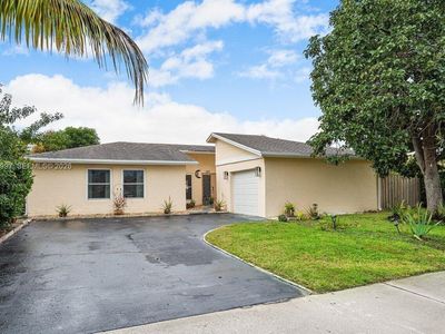 387 NW 39th Way