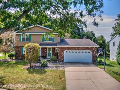 Property at 5706 Wood Valley Dr, Haslett, MI