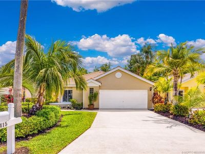 3415 SW Pindo Palm Ln