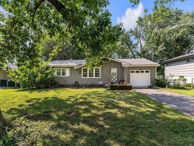 7414 NW Park Forest Ln