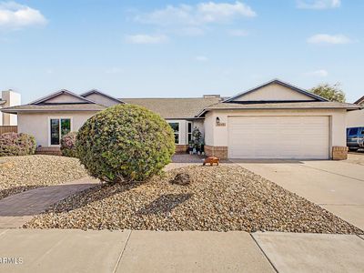 9015 W BUTLER Drive