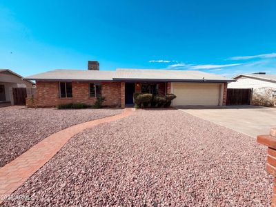1413 W BEHREND Drive