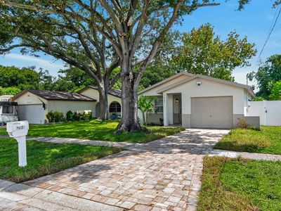 7037 69TH STREET N