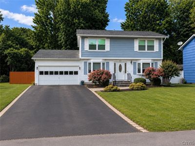 Property at 115 Meadow River Dr, Liverpool, NY