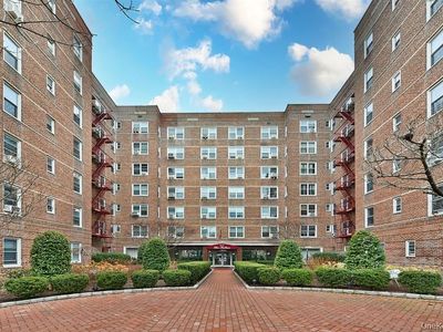 64-11 99th St #418