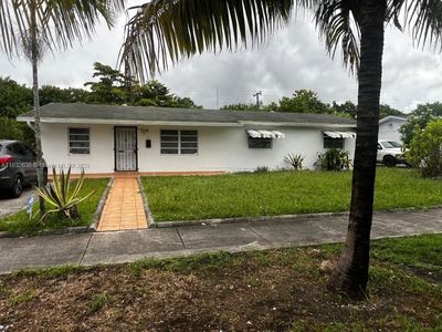 141 NE 209th St