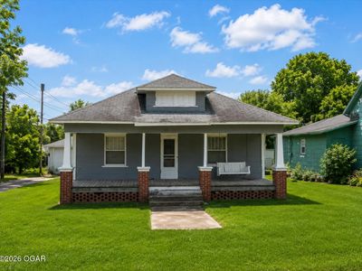 Property at 107 W Maple St, Liberal, MO