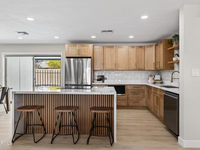 6932 E LATHAM Street