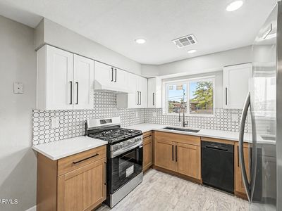 1116 E 3RD Street