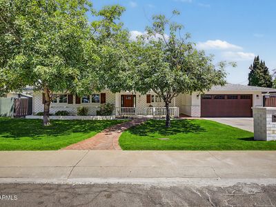 302 E HARMONT Drive