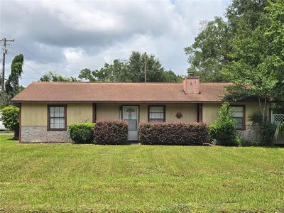 5521 NE 4TH PLACE