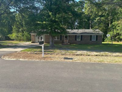 6147 Hughes Ln.