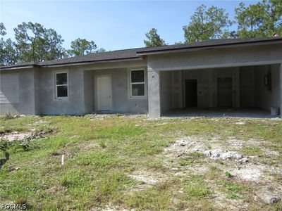 Property at 702 E 15th St, Lehigh Acres, FL