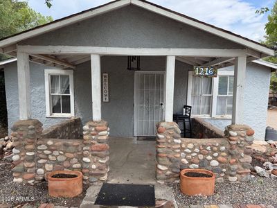 1216 E MINGUS Avenue