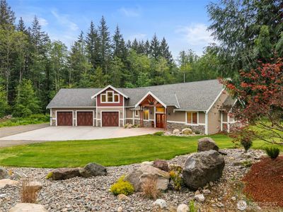 9189 NE Country Woods Lane