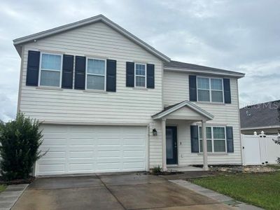 879 NW 251ST DRIVE
