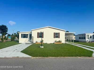 Property at 1001 Waterway Dr, Barefoot Bay, FL