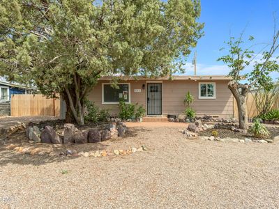 111 E APACHE Street