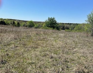 6115 E Wilshire Blvd